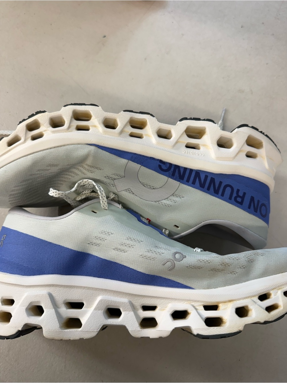 On Running Men’s Athletic Shoes in Light Blue and White